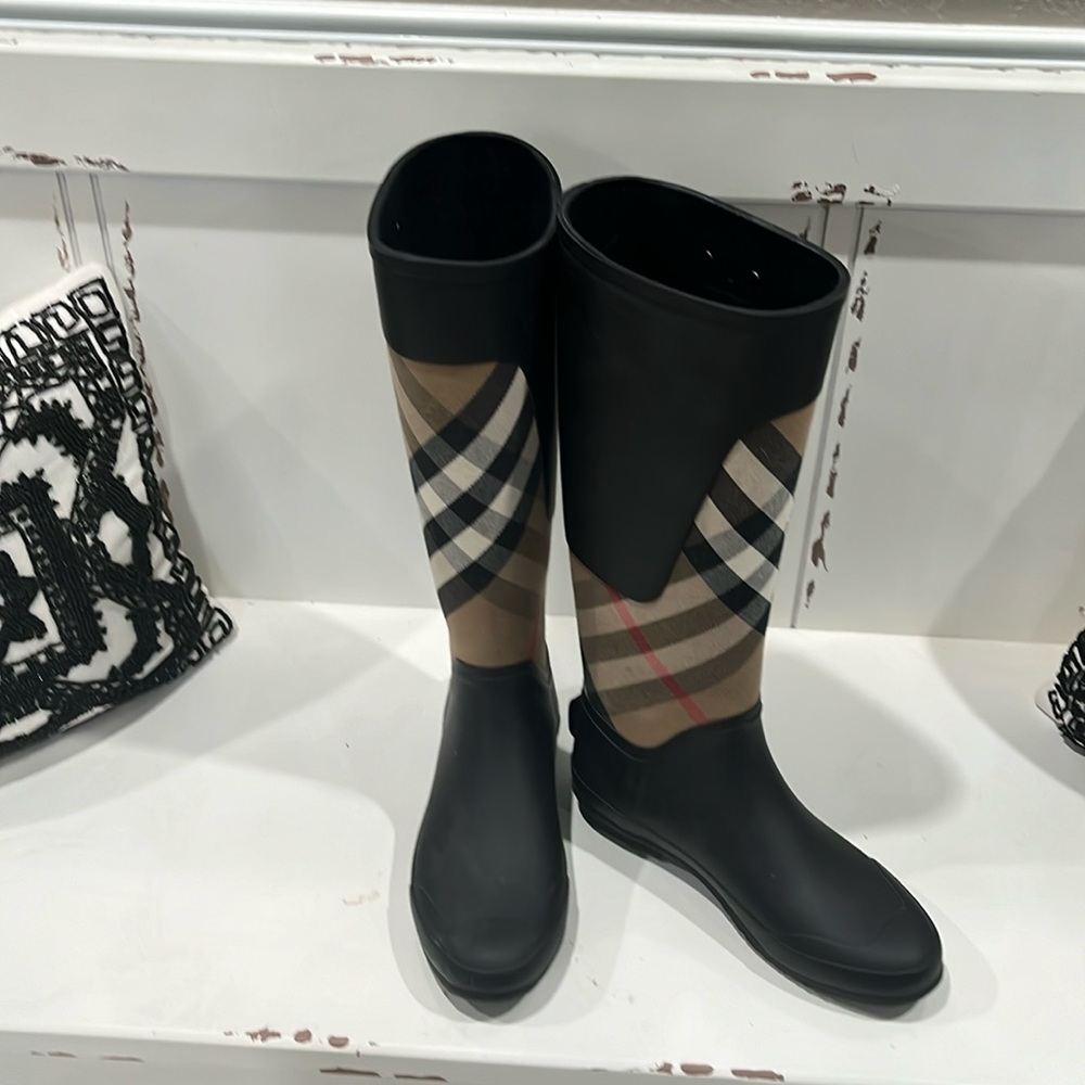 Burberry boots worn once.  Just like new. Perfect condition.